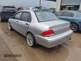 2003 Mitsubishi Lancer ES with VIN JA3AJ26E43U038813, listed as a IAAI auction lot 41778956 with 150,764 mi miles. Bid and sale history available at carsss.com. Image 3.