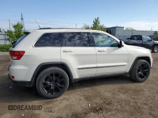 2011 Jeep Grand Cherokee Laredo z VIN 1J4RR4GG1BC506083, wystawiony jako Copart lot #58498295 z przebiegiem 122 847 mil mil oraz Czysty tytuł • Clean title. Historia ofert i sprzedaży dostępna na DreamBid. Obrazek 3.