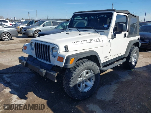 2005 Jeep Wrangler SE with VIN 1J4FA29S95P363770, listed as a IAAI auction lot 41362056 with 140,540 mi miles. Bid and sale history available at carsss.com. Image 2.