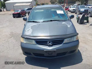 2003 Honda Odyssey EX z VIN 5FNRL18683B097760, wystawiony jako IAAI lot #42479209 z przebiegiem 126 470 mil mil oraz . Historia ofert i sprzedaży dostępna na DreamBid. Obrazek 6.