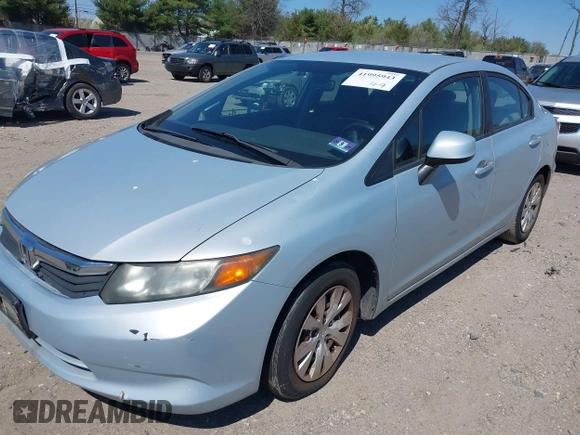 2012 Honda Civic Sdn LX with VIN 2HGFB2F53CH518723, listed as a IAAI auction lot 41995943 with 204,984 mi miles. Bid and sale history available at carsss.com. Image 2.