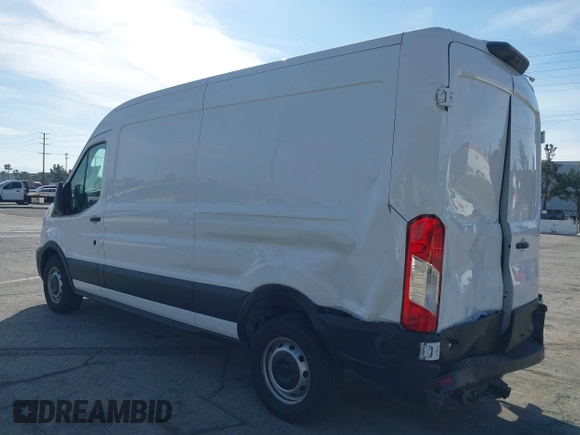 2023 Ford Transit Cargo with VIN 1FTBR1C85PKC08945, listed as a IAAI auction lot 41385685 with 5,577 mi miles and . Bid and sale history available at DreamBid. Image 3.