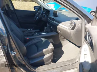 2014 Mazda 3 S Touring with VIN JM1BM1V37E1144331, listed as a IAAI auction lot 41880673 with 102,963 mi miles and . Bid and sale history available at DreamBid. Image 5.