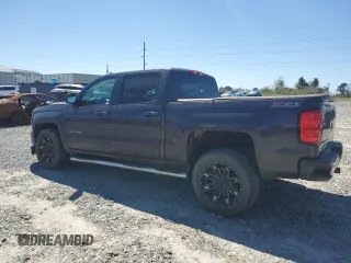 2016 Chevrolet Silverado 1500 LT with VIN 3GCUKREC1GG138154, listed as a Copart auction lot 49115035 with 147,854 mi miles and Salvage Title. Bid and sale history available at DreamBid. Image 2.