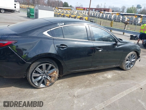 2018 Mazda 6 Touring with VIN JM1GL1VM2J1313375, listed as a IAAI auction lot 41848648 with 93,717 mi miles and . Bid and sale history available at DreamBid. Image 14.