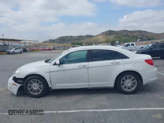 2007 Chrysler Sebring Touring with VIN 1C3LC56R07N536102, listed as a IAAI auction lot 41902390 with 203,037 mi miles and . Bid and sale history available at DreamBid. Image 14.