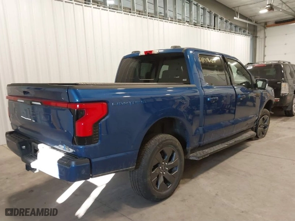 2022 Ford F-150 Lightning Pro with VIN 1FTVW1EL7NWG15923, listed as a IAAI auction lot 41396120 with 25,322 mi miles. Bid and sale history available at carsss.com. Image 4.