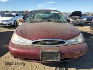 1998 Ford Contour SE z VIN 1FAFP6639WK279655, wystawiony jako Copart lot #77660774 z przebiegiem 89 161 mil mil oraz Szkoda całkowita • Salvage title. Historia ofert i sprzedaży dostępna na DreamBid. Obrazek 5.