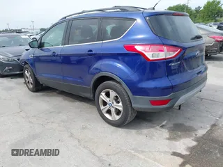 2013 Ford Escape SE with VIN 1FMCU0GXXDUB85818, listed as a IAAI auction lot 41848033 with 128,638 mi miles and . Bid and sale history available at DreamBid. Image 3.