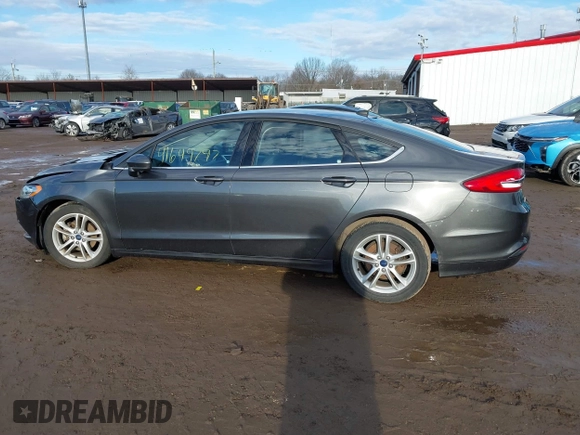 2018 Ford Fusion SE z VIN 3FA6P0HD7JR259606, wystawiony jako IAAI lot #41649797 z przebiegiem 94 094 mil mil oraz . Historia ofert i sprzedaży dostępna na DreamBid. Obrazek 14.