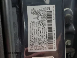 2023 Honda Civic Sport z VIN 2HGFE2F58PH543002, wystawiony jako Copart lot #53985065 z przebiegiem 11 015 mil mil oraz Szkoda całkowita • Salvage title. Historia ofert i sprzedaży dostępna na DreamBid. Obrazek 13.