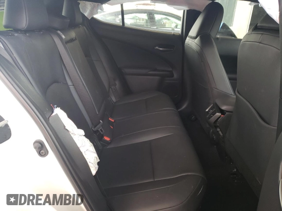 2023 Lexus UX 250h Premium с VIN JTHP6JBH5P2141181, выставлен на аукционе Copart как лот 58265074 с пробегом 3 132 миль миль и На запчасти • Non repairable. История ставок и продаж доступна на DreamBid. Изображение 10.