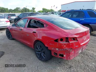 2021 Tesla Model S Plaid with VIN 5YJSA1E60MF447203, listed as a IAAI auction lot 42025120 with 58,190 mi miles. Bid and sale history available at carsss.com. Image 3.