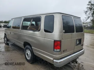 2001 Ford Econoline Passenger XL with VIN 1FBSS31LX1HA23564, listed as a Copart auction lot 77703044 with 276,538 mi miles and Salvage title. Bid and sale history available at DreamBid. Image 2.