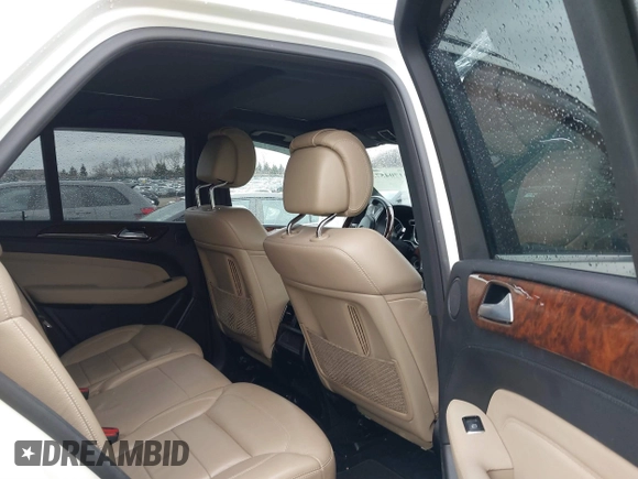 2014 Mercedes-Benz M 550 with VIN 4JGDA7DB1EA362659, listed as a IAAI auction lot 41704573 with 163,341 mi miles and . Bid and sale history available at carsss.com. Image 8.