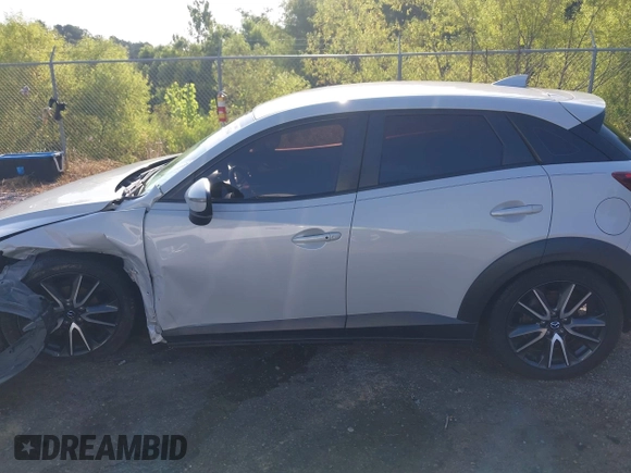 2018 Mazda CX-3 Touring with VIN JM1DKDC73J0319938, listed as a IAAI auction lot 39861564 with 117,199 mi miles. Bid and sale history available at carsss.com. Image 14.