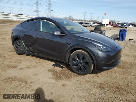 2024 Tesla Model Y with VIN 7SAYGDED7RF163537, listed as a Copart auction lot 48639255 with 7,193 mi miles and Salvage Title. Bid and sale history available at DreamBid. Image 4.