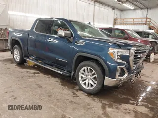 2019 GMC Sierra 1500 SLT z VIN 3GTU9DED3KG137085, wystawiony jako IAAI lot #41263425 z przebiegiem 78 798 mil mil oraz . Historia ofert i sprzedaży dostępna na DreamBid. Obrazek 1.