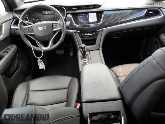 2023 Cadillac XT6 FWD Premium Luxury with VIN 1GYKPCRS5PZ220616, listed as a Copart auction lot 56913725 with 25,860 mi miles and Salvage title. Bid and sale history available at DreamBid. Image 8.