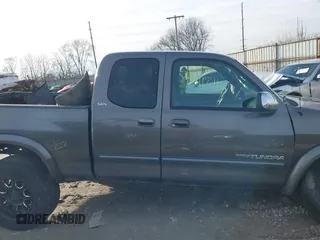 2003 Toyota Tundra SR5 with VIN 5TBBT44153S393708, listed as a IAAI auction lot 41591859 with 107,800 mi miles and . Bid and sale history available at DreamBid. Image 14.