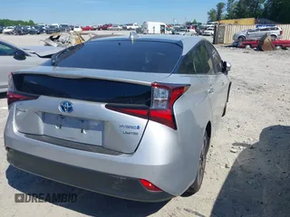 2020 Toyota Prius L Eco z VIN JTDKARFUXL3125434, wystawiony jako IAAI lot #42201623 z przebiegiem 58 609 mil mil oraz . Historia ofert i sprzedaży dostępna na DreamBid. Obrazek 4.