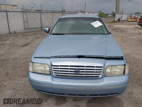 1999 Ford Crown Victoria z VIN 2FAFP73WXXX221069, wystawiony jako IAAI lot #41750127 z przebiegiem 177 142 mil mil oraz . Historia ofert i sprzedaży dostępna na DreamBid. Obrazek 12.