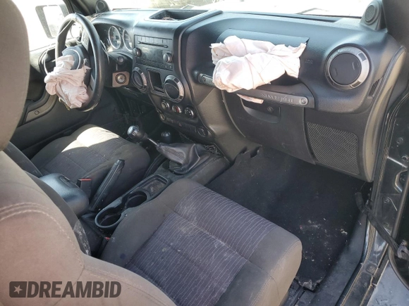 2012 Jeep Wrangler Sport z VIN 1C4AJWAG9CL257841, wystawiony jako Copart lot #57731255 z przebiegiem 112 614 mil mil oraz Szkoda całkowita • Salvage title. Historia ofert i sprzedaży dostępna na DreamBid. Obrazek 8.