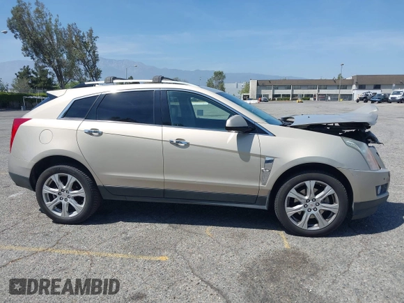 2011 Cadillac SRX Premium Collection z VIN 3GYFNCEY3BS506360, wystawiony jako IAAI lot #42096225 z przebiegiem 173 514 mil mil oraz . Historia ofert i sprzedaży dostępna na DreamBid. Obrazek 13.