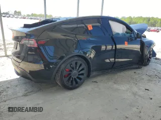 2022 Tesla Model Y Performance z VIN 7SAYGDEF2NF448013, wystawiony jako Copart lot #52323435 z przebiegiem Nie podano mil oraz Nie do naprawy. Historia ofert i sprzedaży dostępna na DreamBid. Obrazek 3.