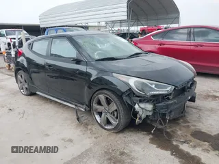 2015 Hyundai Veloster Turbo with VIN KMHTC6AE5FU222872, listed as a IAAI auction lot 42304677 with 102,024 mi miles and . Bid and sale history available at DreamBid. Image 1.