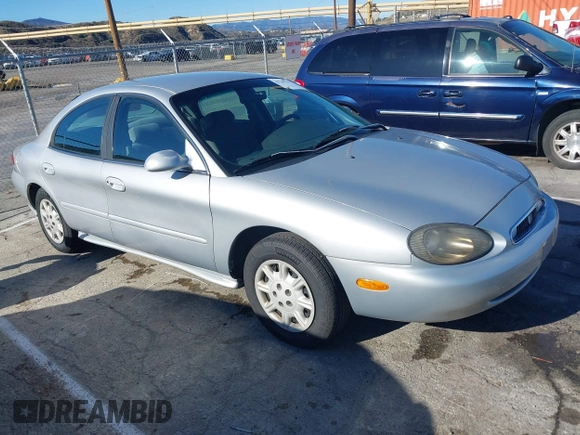 1999 Mercury Sable GS with VIN 1MEFM50U1XA612306, listed as a IAAI auction lot 41745776 with 111,311 mi miles. Bid and sale history available at carsss.com. Image 1.
