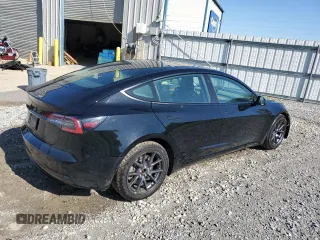 2022 Tesla Model 3 with VIN 5YJ3E1EAXNF286180, listed as a Copart auction lot 52299105 with 129,824 mi miles and Clean Title. Bid and sale history available at carsss.com. Image 3.