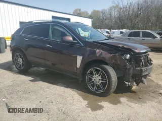 2015 Cadillac SRX Performance Collection z VIN 3GYFNCE30FS533686, wystawiony jako Copart lot #49820745 z przebiegiem 134 363 mil mil oraz Szkoda całkowita • Salvage title. Historia ofert i sprzedaży dostępna na DreamBid. Obrazek 4.