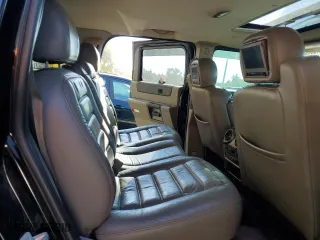 2004 Hummer H2 with VIN 5GRGN23U14H121880, listed as a Copart auction lot 75728834 with 123,989 mi miles and Clean Title. Bid and sale history available at carsss.com. Image 10.
