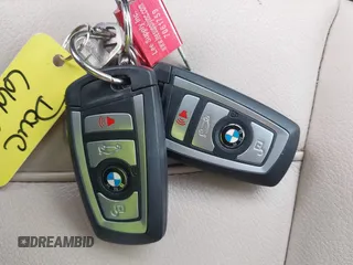 2015 BMW X4 xDrive28i with VIN 5UXXW3C51F0M86668, listed as a IAAI auction lot 42489071 with 59,694 mi miles and . Bid and sale history available at DreamBid. Image 11.