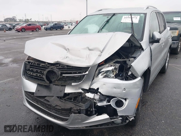 2011 Volkswagen Tiguan SEL w/Premium Navi with VIN WVGAV7AX7BW547613, listed as a IAAI auction lot 41916574 with 140,385 mi miles and . Bid and sale history available at DreamBid. Image 6.