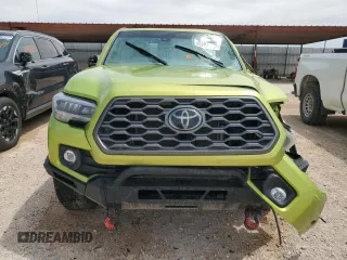 2023 Toyota Tacoma SR z VIN 3TYCZ5AN6PT153777, wystawiony jako Copart lot #56231855 z przebiegiem Nie podano mil oraz Czysty tytuł • Clean title. Historia ofert i sprzedaży dostępna na DreamBid. Obrazek 5.