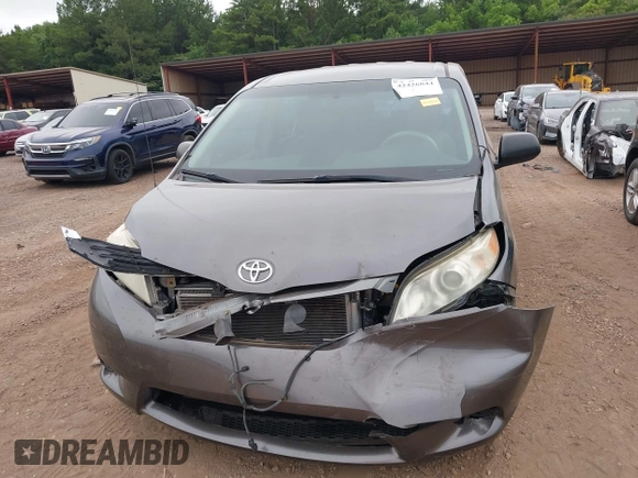 2014 Toyota Sienna L with VIN 5TDZK3DC8ES470837, listed as a IAAI auction lot 42426844 with 302,661 mi miles and . Bid and sale history available at DreamBid. Image 12.