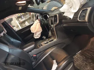2014 Jeep Grand Cherokee Limited with VIN 1C4RJFBT1EC241036, listed as a IAAI auction lot 42179136 with 148,968 mi miles and . Bid and sale history available at DreamBid. Image 5.