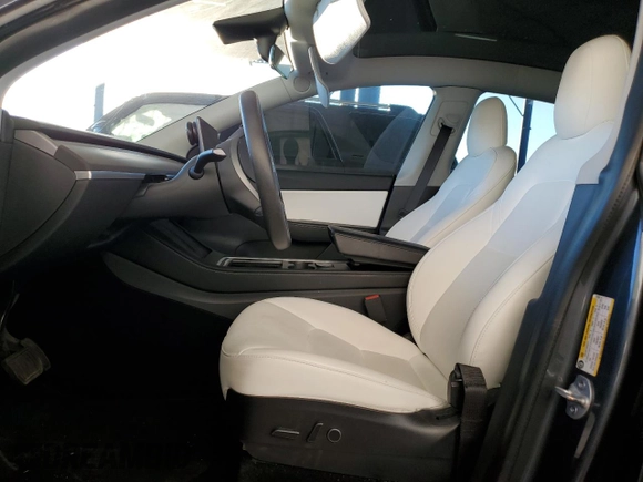 2021 Tesla Model Y Long Range with VIN 5YJYGDEEXMF151557, listed as a Copart auction lot 54936885 with 106,411 mi miles and Salvage Title. Bid and sale history available at DreamBid. Image 7.