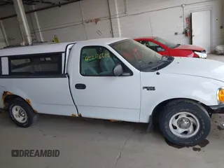 2004 Ford F-150 XL with VIN 2FTRF17214CA28696, listed as a IAAI auction lot 42246526 with 132,403 mi miles and . Bid and sale history available at DreamBid. Image 13.