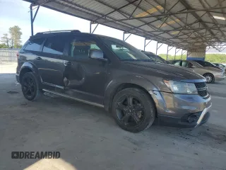 2019 Dodge Journey Crossroad z VIN 3C4PDCGG8KT717064, wystawiony jako Copart lot #55677305 z przebiegiem 115 493 mil mil oraz Szkoda całkowita • Salvage title. Historia ofert i sprzedaży dostępna na DreamBid. Obrazek 4.