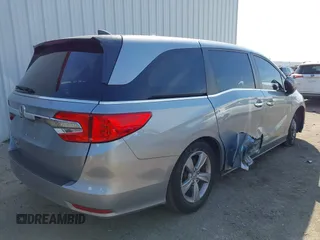 2019 Honda Odyssey EX-L with VIN 5FNRL6H79KB043145, listed as a IAAI auction lot 41569198 with 94,560 mi miles. Bid and sale history available at carsss.com. Image 4.