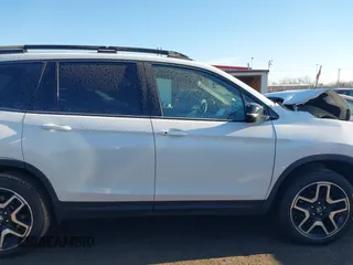 2023 Honda Passport Elite with VIN 5FNYF8H05PB005081, listed as a IAAI auction lot 41698186 with 31,853 mi miles and . Bid and sale history available at DreamBid. Image 13.