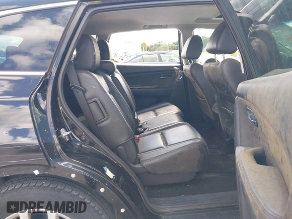 2012 Mazda CX-9 Touring with VIN JM3TB3CV1C0338681, listed as a IAAI auction lot 40458498 with 128,665 mi miles and . Bid and sale history available at DreamBid. Image 8.