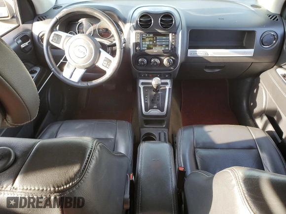 2016 Jeep Compass Latitude with VIN 1C4NJDEB9GD764730, listed as a Copart auction lot 76808544 with 123,937 mi miles and Clean Title. Bid and sale history available at carsss.com. Image 8.