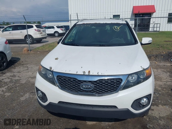 2013 Kia Sorento LX with VIN 5XYKT3A69DG348383, listed as a IAAI auction lot 42195952 with 179,451 mi miles and . Bid and sale history available at carsss.com. Image 6.