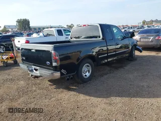 1998 Ford F-150 XL with VIN 1FTRX17L9WNA67717, listed as a IAAI auction lot 41604900 with 133,457 mi miles and . Bid and sale history available at DreamBid. Image 4.