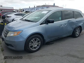 2012 Honda Odyssey EX-L with VIN 5FNRL5H60CB095086, listed as a IAAI auction lot 42251330 with 144,232 mi miles and . Bid and sale history available at DreamBid. Image 17.