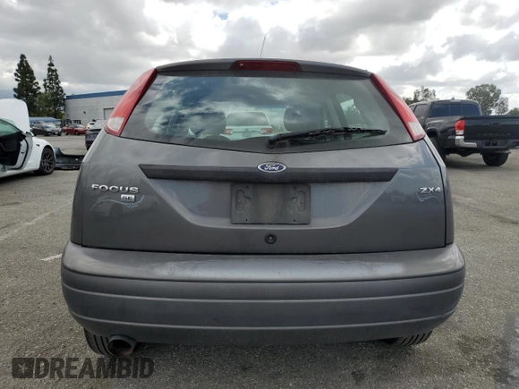 2006 Ford Focus S z VIN 1FAFP37N76W182882, wystawiony jako Copart lot #56939295 z przebiegiem 136 831 mil mil oraz Szkoda całkowita • Salvage title. Historia ofert i sprzedaży dostępna na DreamBid. Obrazek 6.